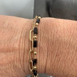 Elegant Gold and Black Bracelet